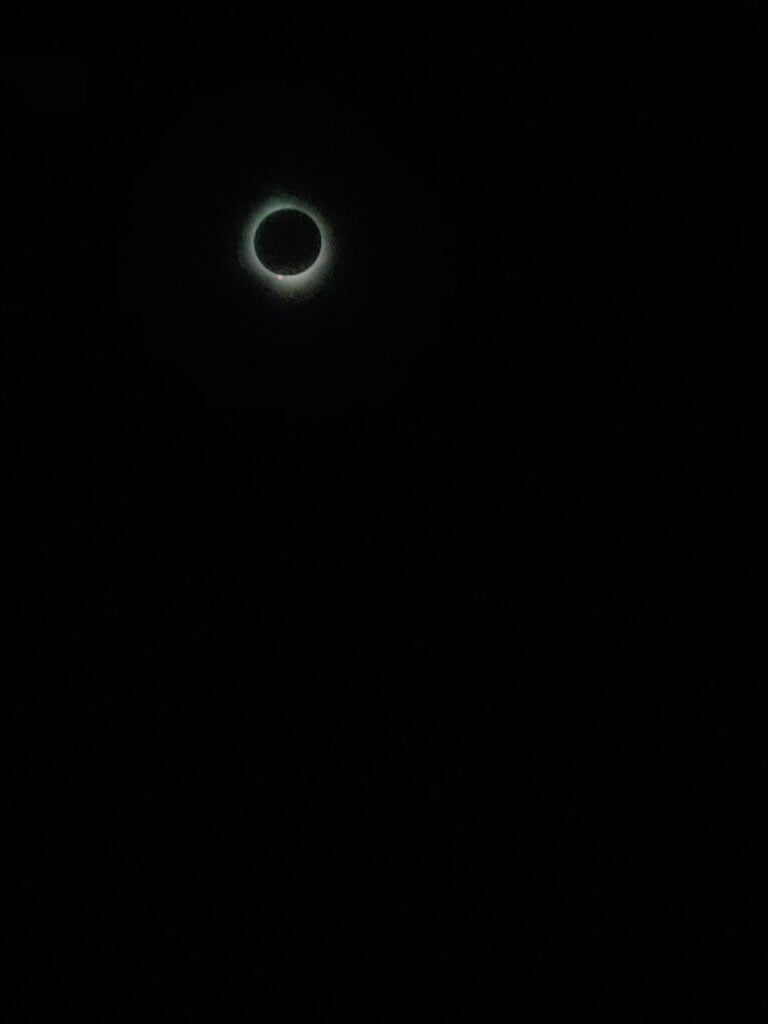 A picture of a solar eclipse at totality